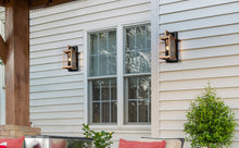 Roigomok 13"H 1-Light Black and Gold Outdoor Wall Light (Clear Glass)